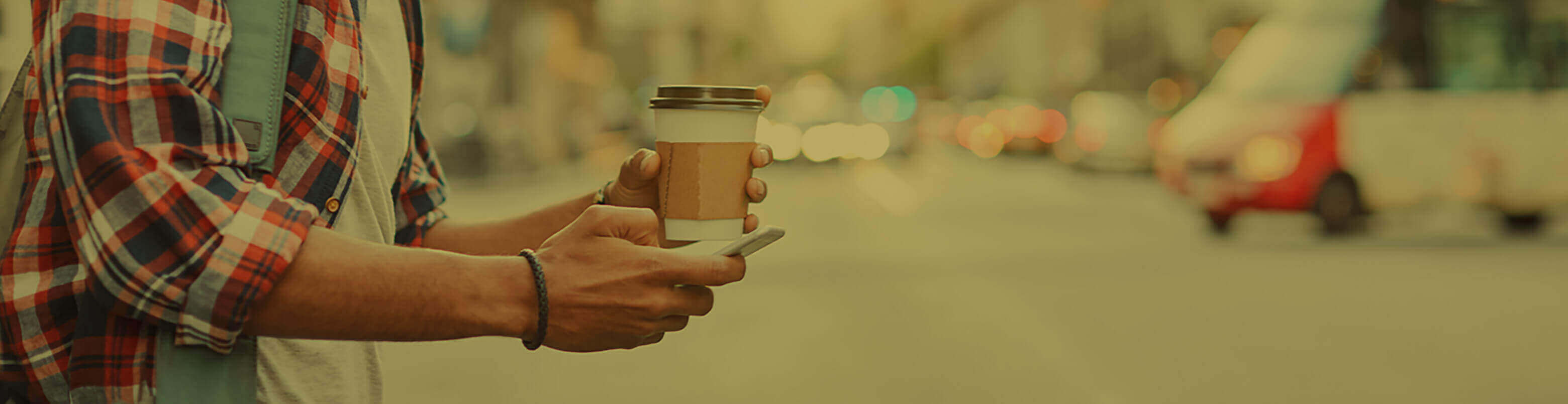 man holding coffee in Fort Smith Arkansas