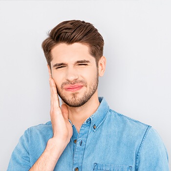 man with tooth pain