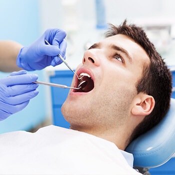 man in dental chair