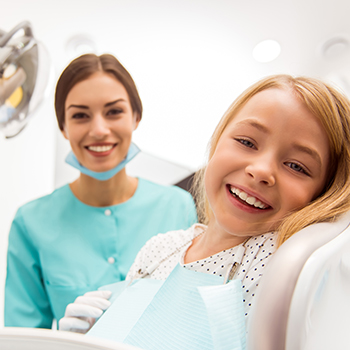 young girl at the dentist