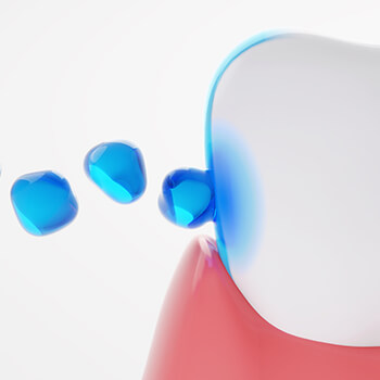 illustration of liquid being repelled by tooth enamel